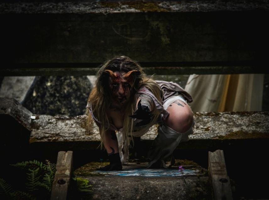 Fantasy creature crouched, cinematic lighting